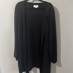 Very thick Hugh quality sweater.  Has a little bit of sparkle in the threading.